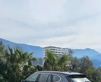 Frontansicht eines Mietwagens BMW X1 in Becici, Montenegro ✓ Auto Nr.11323. ✓ Automatisch TM ✓ 0 Bewertungen.