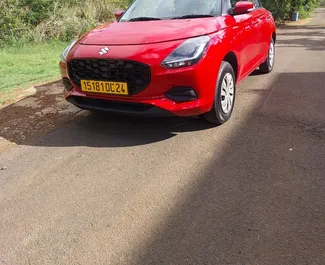 Frontansicht eines Mietwagens Suzuki Swift auf Mauritius, Mauritius ✓ Auto Nr.13070. ✓ Automatisch TM ✓ 0 Bewertungen.