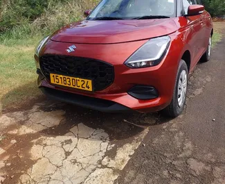 Frontansicht eines Mietwagens Suzuki Swift auf Mauritius, Mauritius ✓ Auto Nr.13069. ✓ Automatisch TM ✓ 0 Bewertungen.