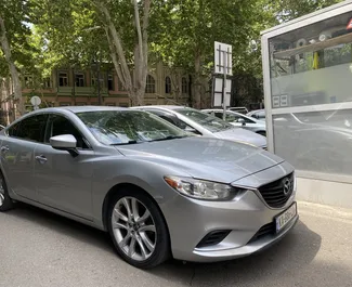 Innenraum von Mazda 6 zur Miete in Georgien. Ein großartiges 5-Sitzer Fahrzeug mit Automatisch Getriebe.