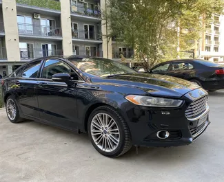 Frontansicht eines Mietwagens Ford Fusion Sedan in Tiflis, Georgien ✓ Auto Nr.13414. ✓ Automatisch TM ✓ 0 Bewertungen.