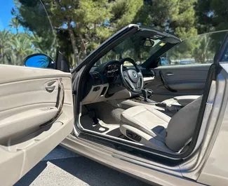 BMW 120d Cabrio 2010 zur Miete verfügbar in Alicante, mit Kilometerbegrenzung 250 km/Tag.