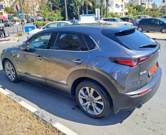 Frontansicht eines Mietwagens Mazda CX-30 in Limassol, Zypern ✓ Auto Nr.13931. ✓ Automatisch TM ✓ 0 Bewertungen.