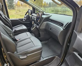 Innenraum von Hyundai Staria zur Miete in Weißrussland. Ein großartiges 9-Sitzer Fahrzeug mit Automatisch Getriebe.