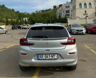 Vermietung Suzuki Baleno. Wirtschaft, Komfort Fahrzeug zur Miete in Georgien ✓ Kaution Keine Kaution ✓ Versicherungsoptionen KFZ-HV, VKV Plus, VKV Komplett, Insassen, Keine Kaution.