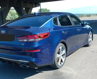 Vermietung Kia Optima. Komfort, Premium Fahrzeug zur Miete in Georgien ✓ Kaution Einzahlung von 300 GEL ✓ Versicherungsoptionen KFZ-HV, VKV Plus, VKV Komplett, Insassen, Diebstahlschutz, Junge.