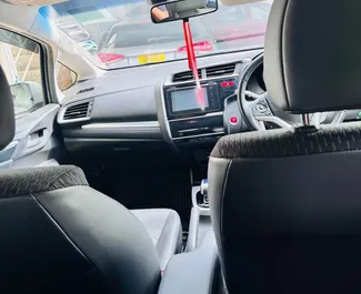 Frontansicht eines Mietwagens Honda Fit auf Mauritius, Mauritius ✓ Auto Nr.14452. ✓ Automatisch TM ✓ 0 Bewertungen.