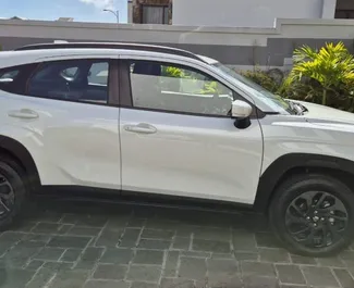 Frontansicht eines Mietwagens Suzuki Fronx auf Mauritius Flughafen, Mauritius ✓ Auto Nr.14562. ✓ Automatisch TM ✓ 0 Bewertungen.