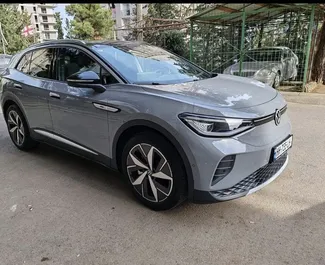 Vermietung Volkswagen ID4. Komfort, Crossover Fahrzeug zur Miete in Georgien ✓ Kaution Keine Kaution ✓ Versicherungsoptionen KFZ-HV.