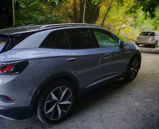 Mietwagen Volkswagen ID4 2023 in Georgien, mit Elektrizität-Kraftstoff und 465 PS ➤ Ab 235 GEL pro Tag.