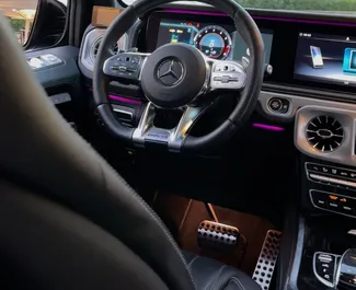 Mietwagen Mercedes-Benz G63 AMG 2023 in VAE, mit Benzin-Kraftstoff und 570 PS ➤ Ab 1200 AED pro Tag.