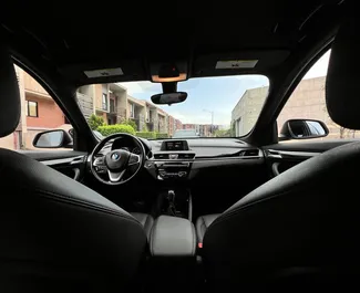 Vermietung BMW X1. Komfort, Premium, Crossover Fahrzeug zur Miete in Georgien ✓ Kaution Keine Kaution ✓ Versicherungsoptionen KFZ-HV, TKV, VKV Plus, VKV Komplett, Insassen.
