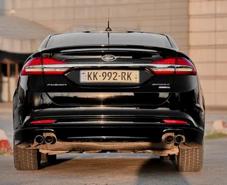 Vermietung Ford Fusion Sedan. Komfort, Premium Fahrzeug zur Miete in Georgien ✓ Kaution Keine Kaution ✓ Versicherungsoptionen KFZ-HV, TKV, VKV Plus, VKV Komplett, Insassen, Diebstahlschutz.