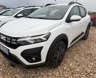 Vermietung Dacia Sandero Stepway. Wirtschaft, Komfort, Crossover Fahrzeug zur Miete in Albanien ✓ Kaution Keine Kaution ✓ Versicherungsoptionen KFZ-HV, TKV, VKV Plus, VKV Komplett, Diebstahlschutz, Ausland, Junge.