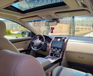 Vermietung Mazda CX-9. Komfort, Premium, Crossover Fahrzeug zur Miete in Aserbaidschan ✓ Kaution Einzahlung von 200 AZN ✓ Versicherungsoptionen KFZ-HV, TKV, Diebstahlschutz.