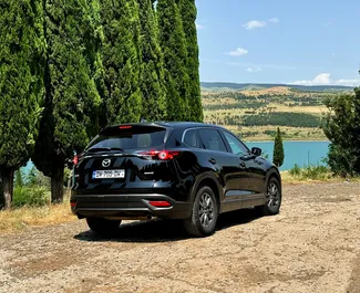 Mietwagen Mazda CX-9 2019 in Georgien, mit Benzin-Kraftstoff und 231 PS ➤ Ab 135 GEL pro Tag.