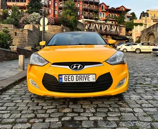 Frontansicht eines Mietwagens Hyundai Veloster in Tiflis, Georgien ✓ Auto Nr.8062. ✓ Automatisch TM ✓ 0 Bewertungen.