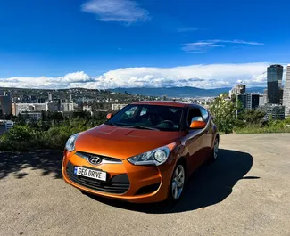 Frontansicht eines Mietwagens Hyundai Veloster in Tiflis, Georgien ✓ Auto Nr.14605. ✓ Automatisch TM ✓ 0 Bewertungen.