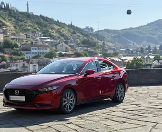 Frontansicht eines Mietwagens Mazda 3 in Tiflis, Georgien ✓ Auto Nr.14636. ✓ Automatisch TM ✓ 0 Bewertungen.