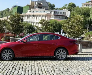 Vermietung Mazda 3. Wirtschaft, Komfort Fahrzeug zur Miete in Georgien ✓ Kaution Keine Kaution ✓ Versicherungsoptionen KFZ-HV, TKV, VKV Plus, VKV Komplett, Insassen, Diebstahlschutz.