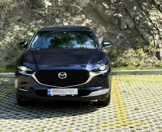 Frontansicht eines Mietwagens Mazda CX-30 in Tiflis, Georgien ✓ Auto Nr.14631. ✓ Automatisch TM ✓ 0 Bewertungen.