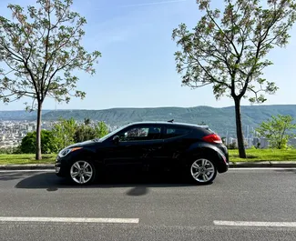 Frontansicht eines Mietwagens Hyundai Veloster in Tiflis, Georgien ✓ Auto Nr.14604. ✓ Automatisch TM ✓ 0 Bewertungen.