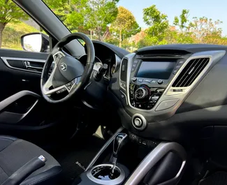 Vermietung Hyundai Veloster. Komfort Fahrzeug zur Miete in Georgien ✓ Kaution Keine Kaution ✓ Versicherungsoptionen KFZ-HV, TKV, VKV Plus, VKV Komplett, Insassen, Diebstahlschutz.