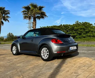 Volkswagen Beetle Cabrio 2015 zur Miete verfügbar in Tiflis, mit Kilometerbegrenzung unbegrenzte.