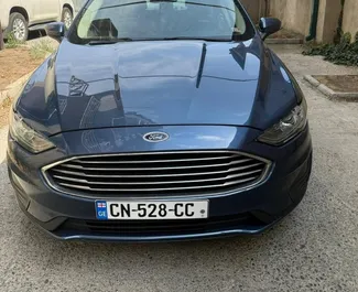 Vermietung Ford Fusion Sedan. Komfort, Premium Fahrzeug zur Miete in Georgien ✓ Kaution Keine Kaution ✓ Versicherungsoptionen KFZ-HV, VKV Komplett, Diebstahlschutz, Keine Kaution.