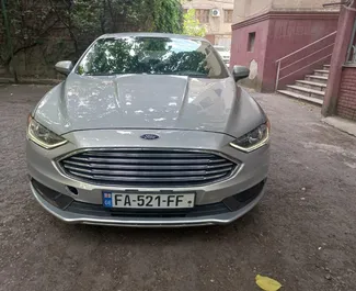 Frontansicht eines Mietwagens Ford Fusion Sedan in Tiflis, Georgien ✓ Auto Nr.14832. ✓ Automatisch TM ✓ 0 Bewertungen.