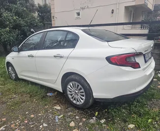 Autovermietung Fiat Egea Nr.15281 Schaltgetriebe am Flughafen Dalaman, ausgestattet mit einem 1,4L Motor ➤ Von Gökhan in der Türkei.
