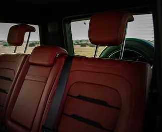 Vermietung Mercedes-Benz G63 AMG. Premium, Luxus, SUV Fahrzeug zur Miete in VAE ✓ Kaution Einzahlung von 2500 AED ✓ Versicherungsoptionen KFZ-HV.