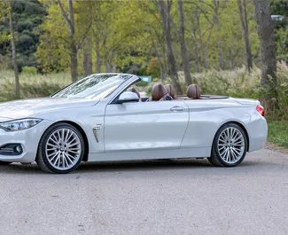Frontansicht eines Mietwagens BMW 428i Cabrio in Becici, Montenegro ✓ Auto Nr.2476. ✓ Automatisch TM ✓ 0 Bewertungen.