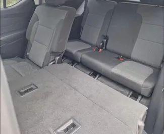 Vermietung Chevrolet Traverse. Komfort, SUV Fahrzeug zur Miete in Georgien ✓ Kaution Keine Kaution ✓ Versicherungsoptionen KFZ-HV, TKV, VKV Komplett, Junge.