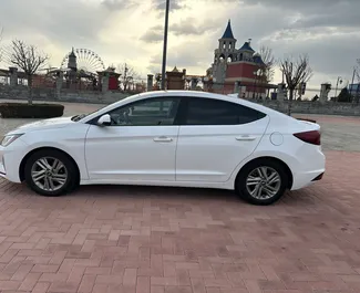 Vermietung Hyundai Elantra. Komfort Fahrzeug zur Miete in Armenien ✓ Kaution Einzahlung von 190 USD ✓ Versicherungsoptionen KFZ-HV, TKV, VKV Plus, VKV Komplett, Insassen, Diebstahlschutz, Ausland, Junge, Keine Kaution.
