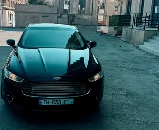 Frontansicht eines Mietwagens Ford Fusion Sedan in Tiflis, Georgien ✓ Auto Nr.15811. ✓ Automatisch TM ✓ 0 Bewertungen.