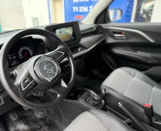 Frontansicht eines Mietwagens Suzuki Swift in Tunis, Tunesien ✓ Auto Nr.15895. ✓ Automatisch TM ✓ 0 Bewertungen.