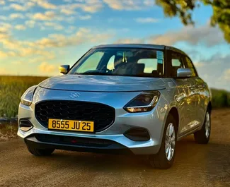 Frontansicht eines Mietwagens Suzuki Swift auf Mauritius, Mauritius ✓ Auto Nr.15652. ✓ Automatisch TM ✓ 0 Bewertungen.