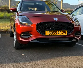 Frontansicht eines Mietwagens Suzuki Swift auf Mauritius, Mauritius ✓ Auto Nr.15653. ✓ Automatisch TM ✓ 0 Bewertungen.