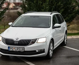 Frontansicht eines Mietwagens Skoda Octavia Combi in Podgorica, Montenegro ✓ Auto Nr.9027. ✓ Automatisch TM ✓ 0 Bewertungen.