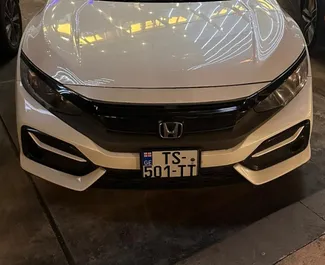 Vermietung Honda Civic. Wirtschaft, Komfort Fahrzeug zur Miete in Georgien ✓ Kaution Keine Kaution ✓ Versicherungsoptionen KFZ-HV, TKV, Keine Kaution.