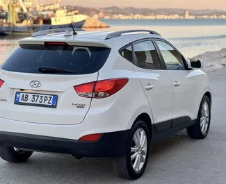 Vermietung Hyundai Tucson. Wirtschaft, Komfort, SUV, Crossover Fahrzeug zur Miete in Albanien ✓ Kaution Keine Kaution ✓ Versicherungsoptionen KFZ-HV, VKV Komplett, Ausland.