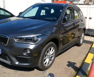 Autovermietung BMW X1 Nr.15686 Automatisch am Flughafen Podgorica, ausgestattet mit einem 1,5L Motor ➤ Von Yan in Montenegro.