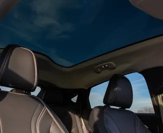 Vermietung Ford Mustang Mach E. Premium, Luxus, SUV Fahrzeug zur Miete in Georgien ✓ Kaution Einzahlung von 560 GEL ✓ Versicherungsoptionen KFZ-HV, TKV, VKV Plus, VKV Komplett, Insassen, Diebstahlschutz.