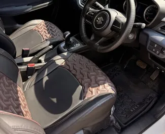 Vermietung Suzuki Baleno. Wirtschaft, Komfort Fahrzeug zur Miete in Goa ✓ Kaution Einzahlung von 60 USD ✓ Versicherungsoptionen KFZ-HV.