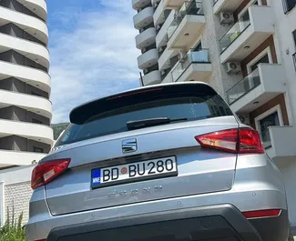 Frontansicht eines Mietwagens SEAT Arona am Flughafen Podgorica, Montenegro ✓ Auto Nr.16088. ✓ Automatisch TM ✓ 0 Bewertungen.