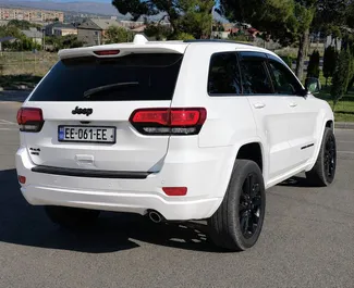 Vermietung Jeep Grand Cherokee. Komfort, Premium, SUV Fahrzeug zur Miete in Georgien ✓ Kaution Keine Kaution ✓ Versicherungsoptionen KFZ-HV, VKV Plus, VKV Komplett, Insassen, Diebstahlschutz, Keine Kaution.