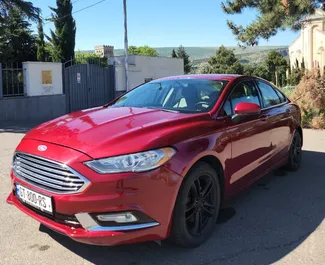 Frontansicht eines Mietwagens Ford Fusion Sedan in Tiflis, Georgien ✓ Auto Nr.16508. ✓ Automatisch TM ✓ 0 Bewertungen.