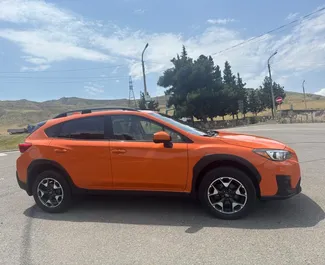 Innenraum von Subaru Crosstrek zur Miete in Georgien. Ein großartiges 5-Sitzer Fahrzeug mit Automatisch Getriebe.