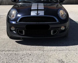 Frontansicht eines Mietwagens Mini Cooper S Cabrio in Budva, Montenegro ✓ Auto Nr.16573. ✓ Schaltgetriebe TM ✓ 0 Bewertungen.